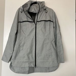 Womens grey long rain coat. Size M. Like new.